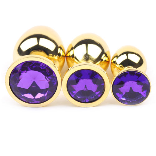 Medium Golden Metallic Anal Plug with Purple Gem